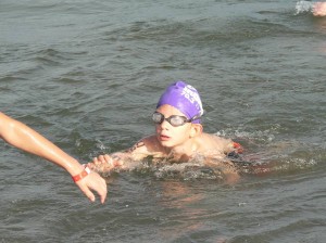 Luke finishing the swim